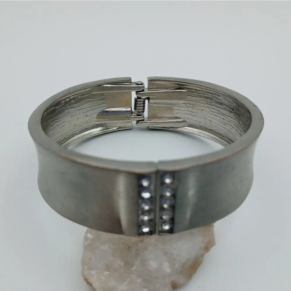 Silver tone hinge bracelet crystal encrusted accent. B533